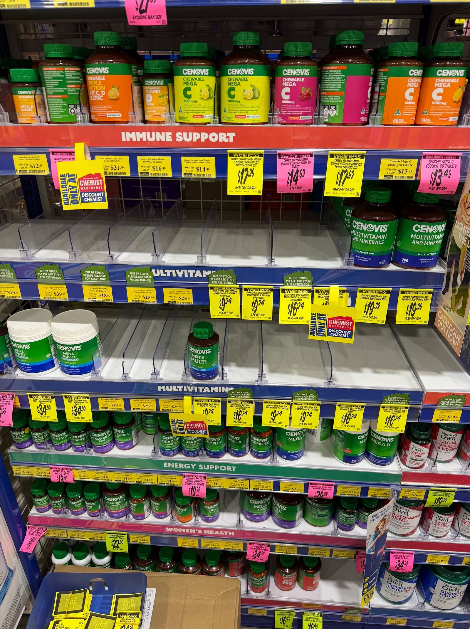 A vitamins shelf with product facings, shelf labels and several empty positions